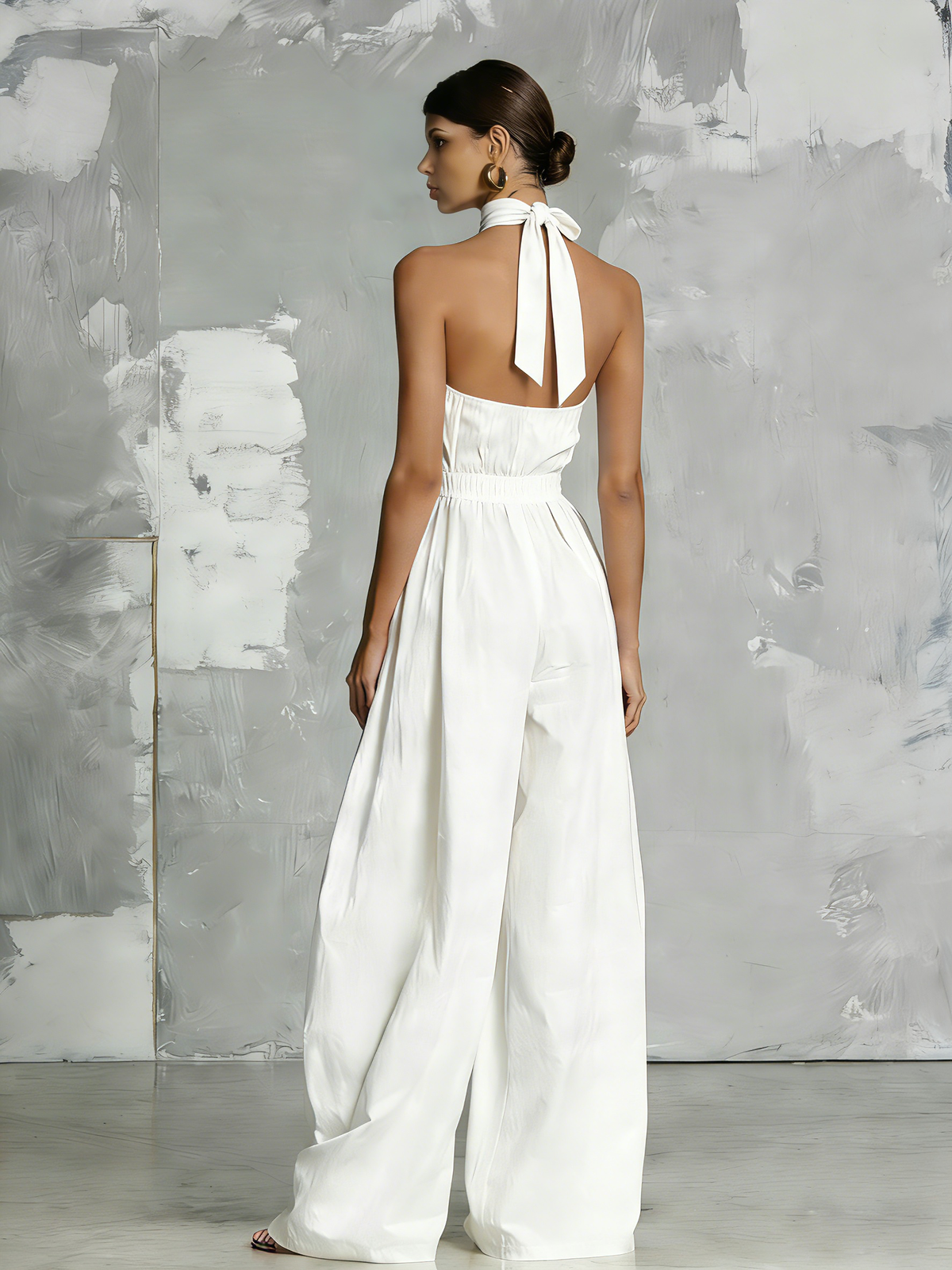 Zoltán | Elegante mono blanco tejido sin mangas con cuello halter