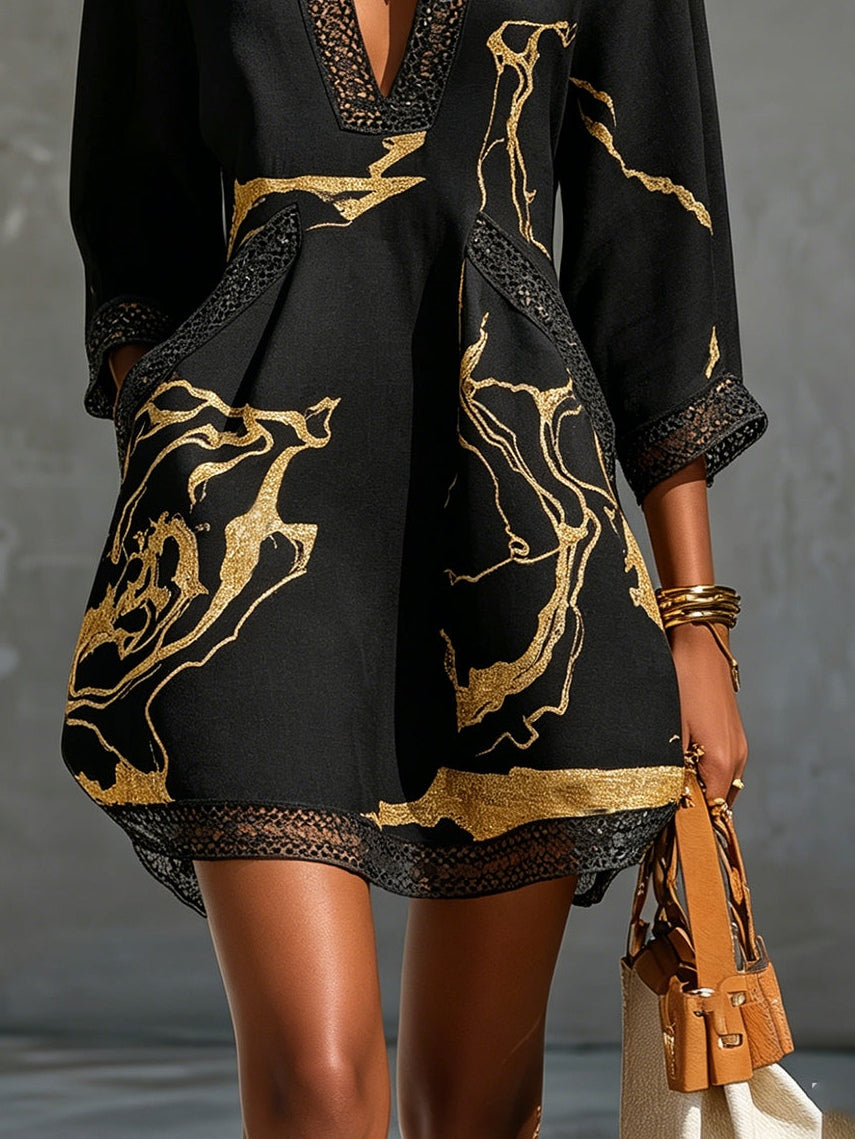 Diana - Vestido corto estampado en negro y dorado con escote en V y encaje de crochet